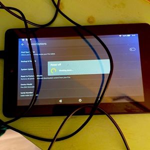 Amazon fire tablet.  With charger.